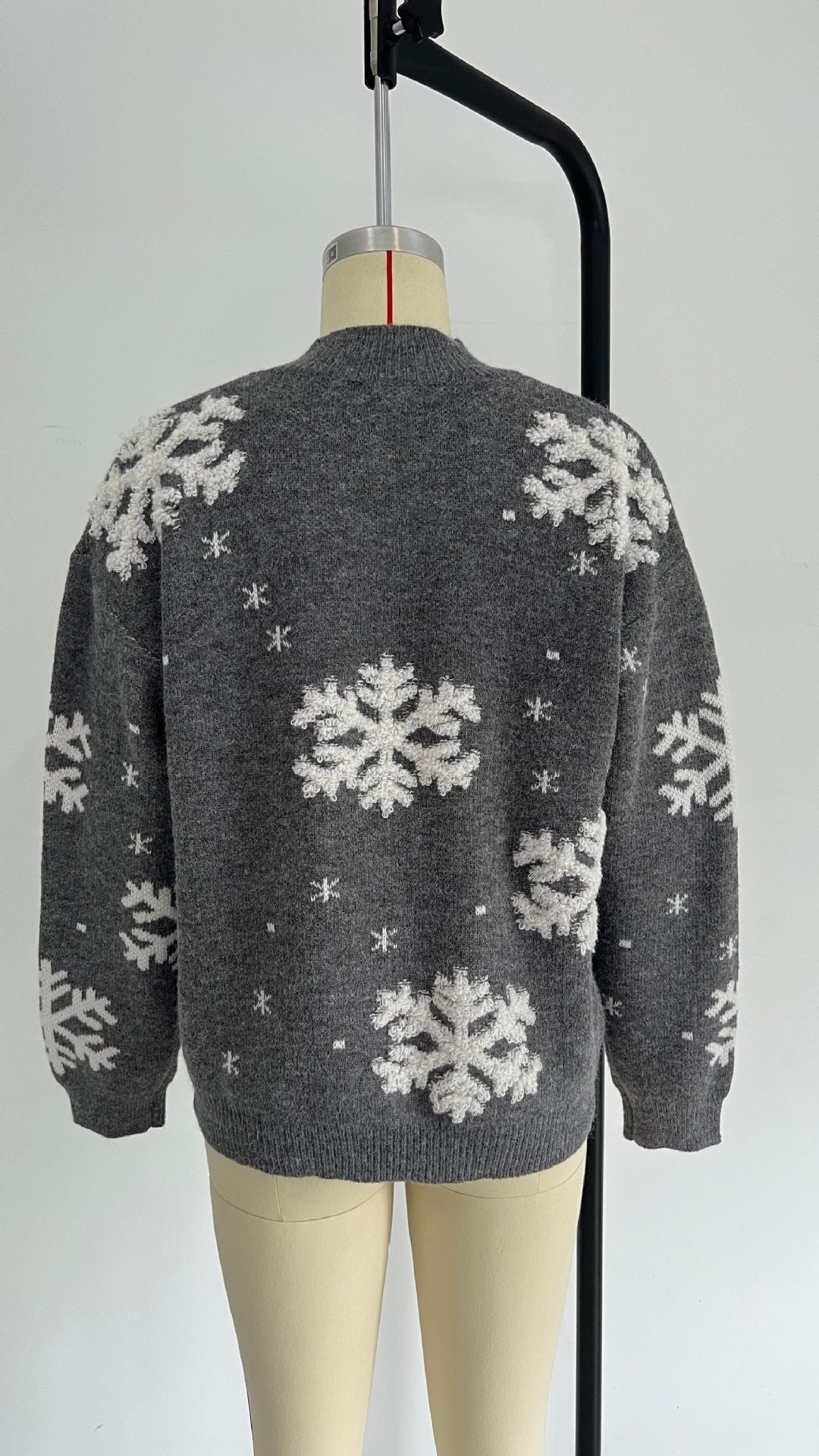 Woman in a fluffy snowflake Christmas jumper