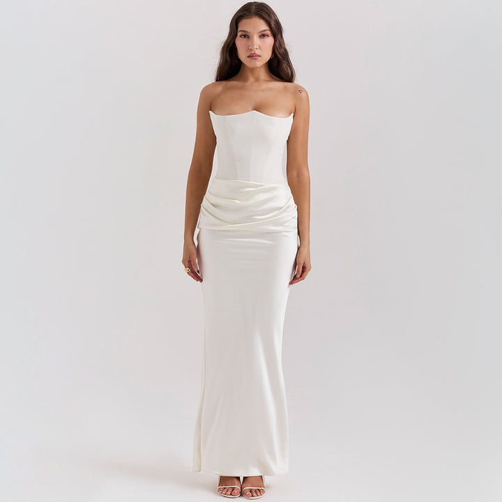 Woman in a strapless satin maxi dress
