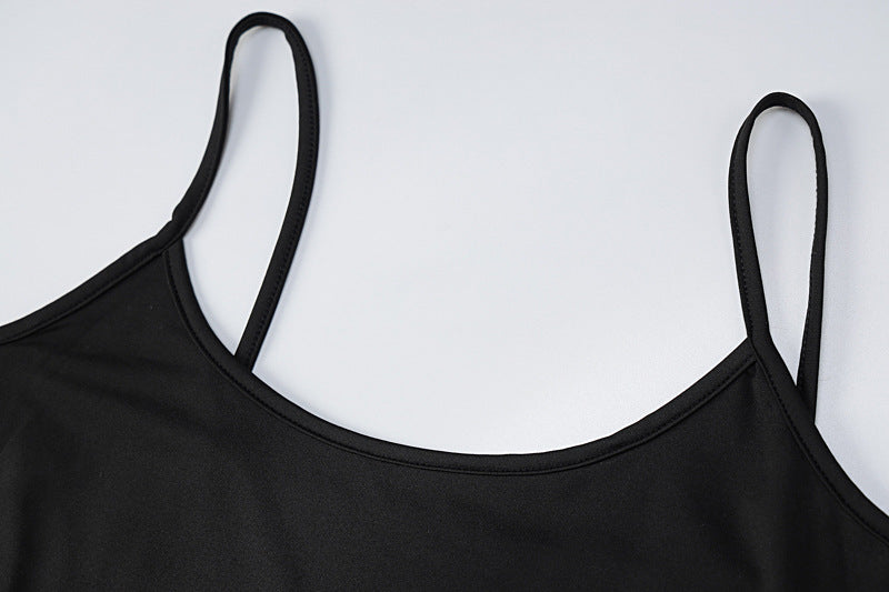 Woman in black bodycon maxi dress