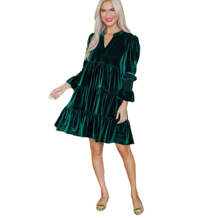 Woman in a velvet tiered mini dress