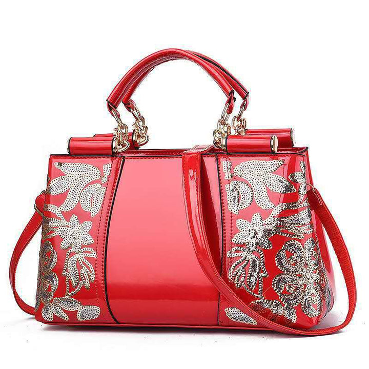 Sequin embroidered patent evening handbag
