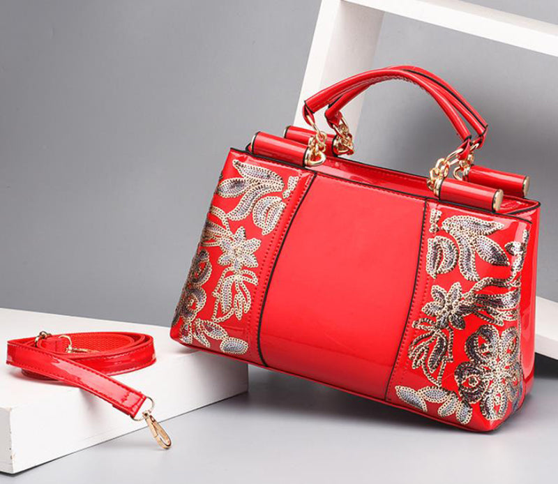 Sequin embroidered patent evening handbag